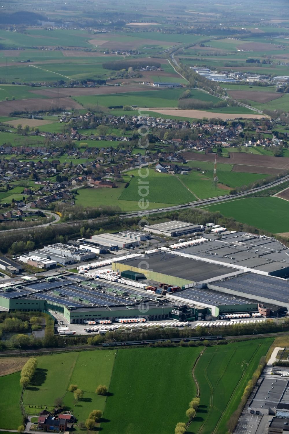 Aerial photograph Halle - Building complex and distribution center on the site der Colruyt Group in Halle in Vlaan deren, Belgium