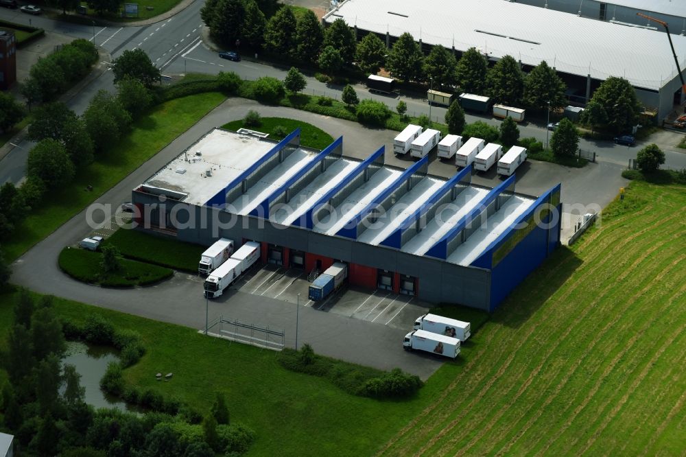 Schwarzenbek from the bird's eye view: Building complex and distribution center on the site of Ernsting's family GmbH & Co. KG on Industriestrasse - Grabauer Strasse in Schwarzenbek in the state Schleswig-Holstein, Germany