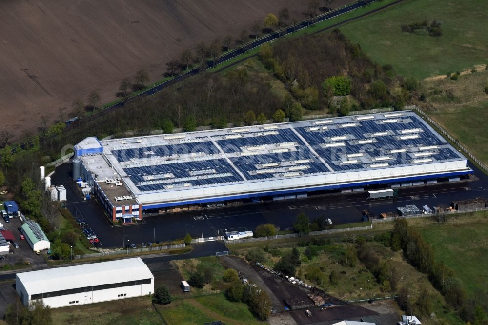 Aerial photograph Wiesenburg/Mark - Building complex and distribution center on the site Flaeming-Quellen Verwaltungs GmbH on Mehlbeerenweg in Wiesenburg/Mark in the state Brandenburg