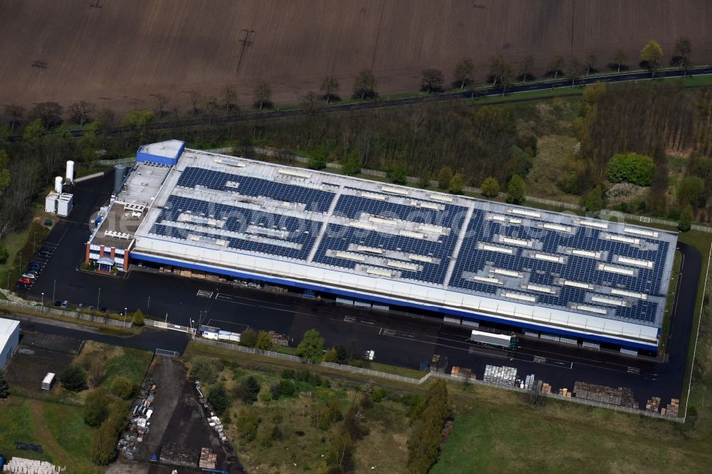 Wiesenburg/Mark from the bird's eye view: Building complex and distribution center on the site Flaeming-Quellen Verwaltungs GmbH on Mehlbeerenweg in Wiesenburg/Mark in the state Brandenburg