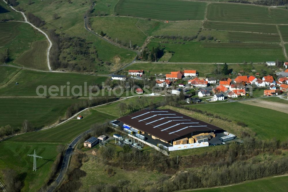 Poppenhausen (Wasserkuppe) from the bird's eye view: Building complex and distribution center on the site of Aloysius Krenzer GmbH in the district Sieblos in Poppenhausen (Wasserkuppe) in the state Hesse, Germany