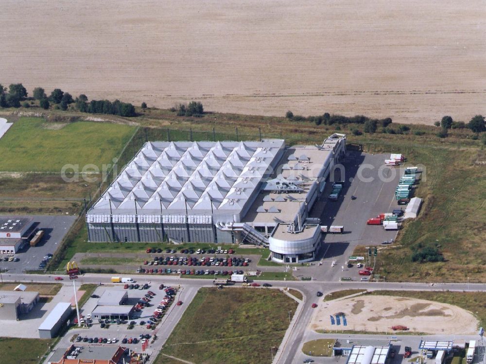 Ahrensfelde from above - Building complex and distribution center on the site Moebel Huebner in Ahrensfelde in the state Brandenburg