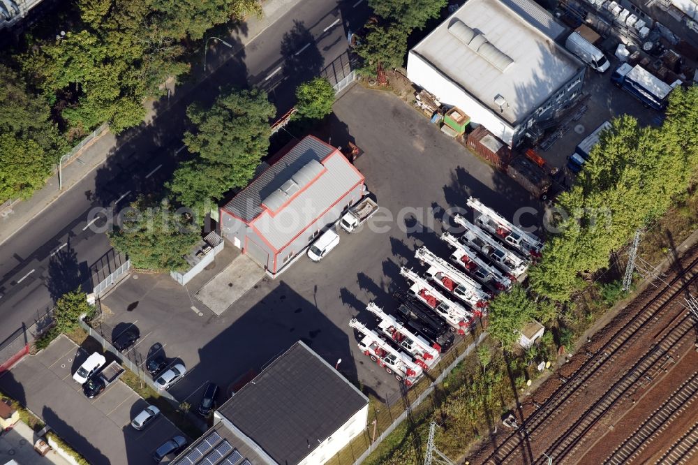 Berlin from the bird's eye view: Building complex and distribution center on the site Mueller und Sohn Kranservice GmbH on the Freiheit destrict Ruhleben in Berlin