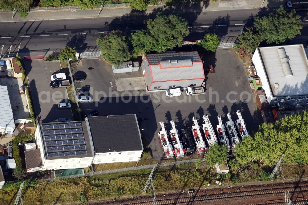 Aerial image Berlin - Building complex and distribution center on the site Mueller und Sohn Kranservice GmbH on the Freiheit destrict Ruhleben in Berlin