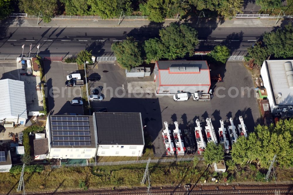 Aerial photograph Berlin - Building complex and distribution center on the site Mueller und Sohn Kranservice GmbH on the Freiheit destrict Ruhleben in Berlin