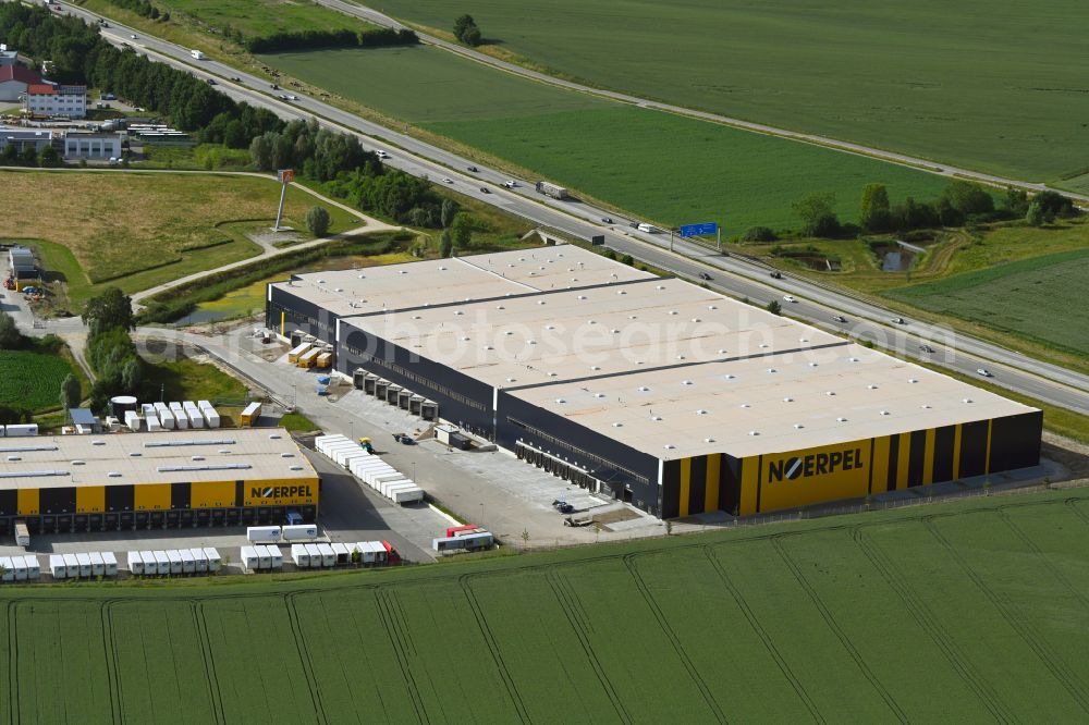 Odelzhausen from the bird's eye view: Building complex and distribution center on the site of C.E. Noerpel GmbH in Odelzhausen in the state Bavaria, Germany