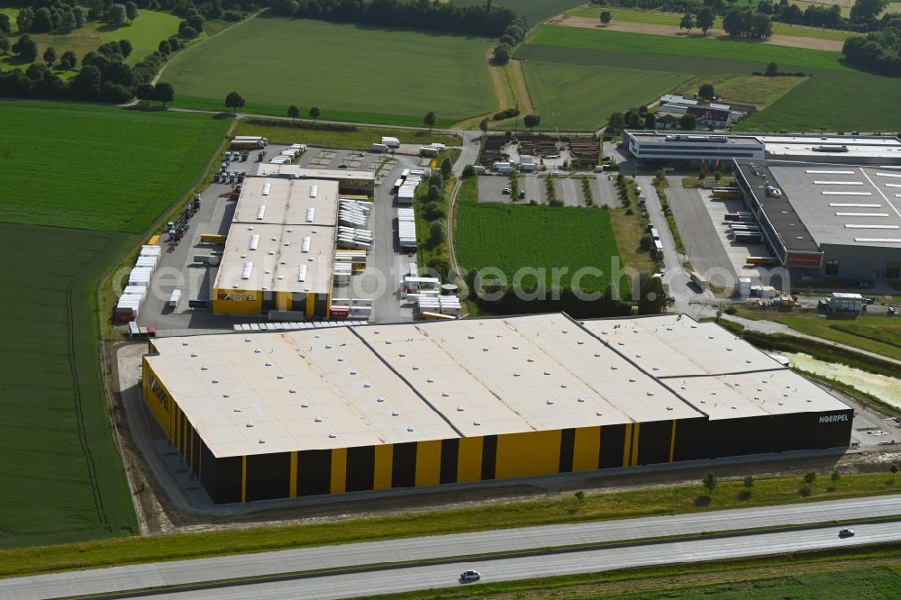 Odelzhausen from the bird's eye view: Building complex and distribution center on the site of C.E. Noerpel GmbH in Odelzhausen in the state Bavaria, Germany