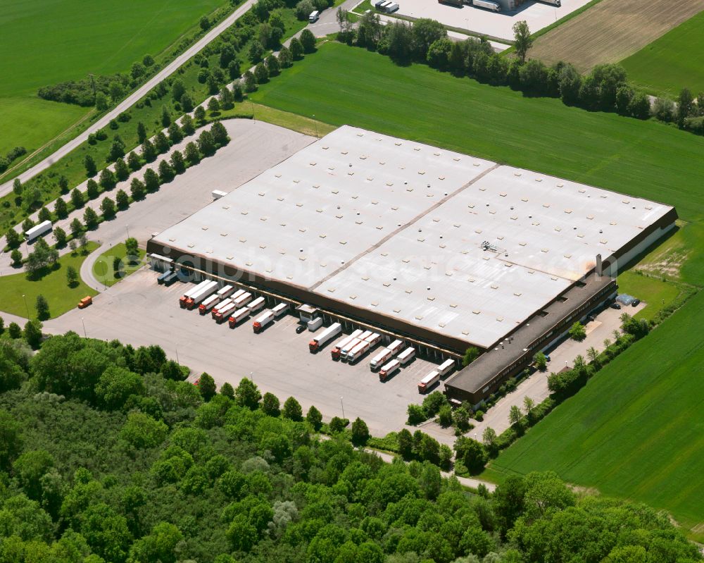 Dettingen an der Iller from the bird's eye view: Building complex and distribution center on the site of NORMA Lebensmittelfilialbetrieb Stiftung & Co. KG on street Robert-Bosch-Strasse in Dettingen an der Iller in the state Baden-Wuerttemberg, Germany