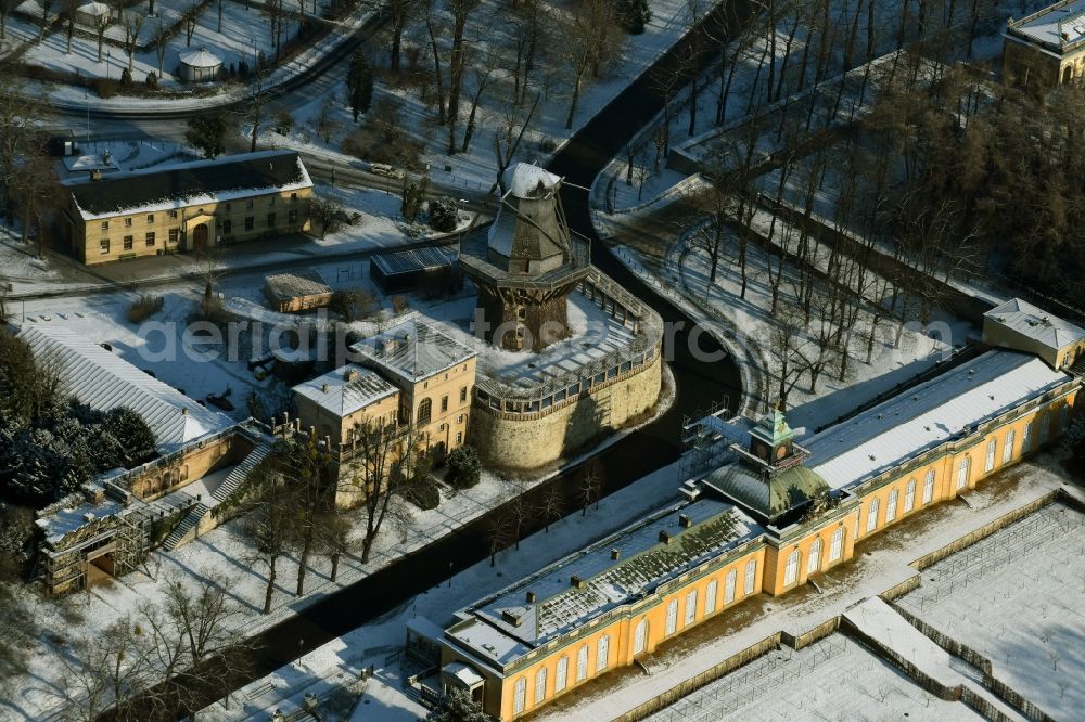 Aerial photograph Potsdam - Building complex of the New Chambers and the Historic Mill in the snow covered Sanssouci park in Potsdam in the state of Brandenburg