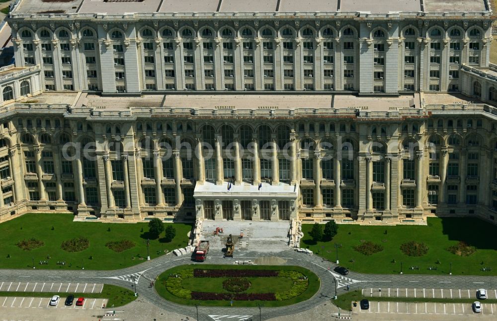 Aerial photograph Bukarest - View of the building Palace of the People in Bucharest, Romania. The magnificent building at the same time used as the parliamentary seat is built in real-socialist, Stalinist embossed power architecture and also houses the National Museum of Contemporary Art