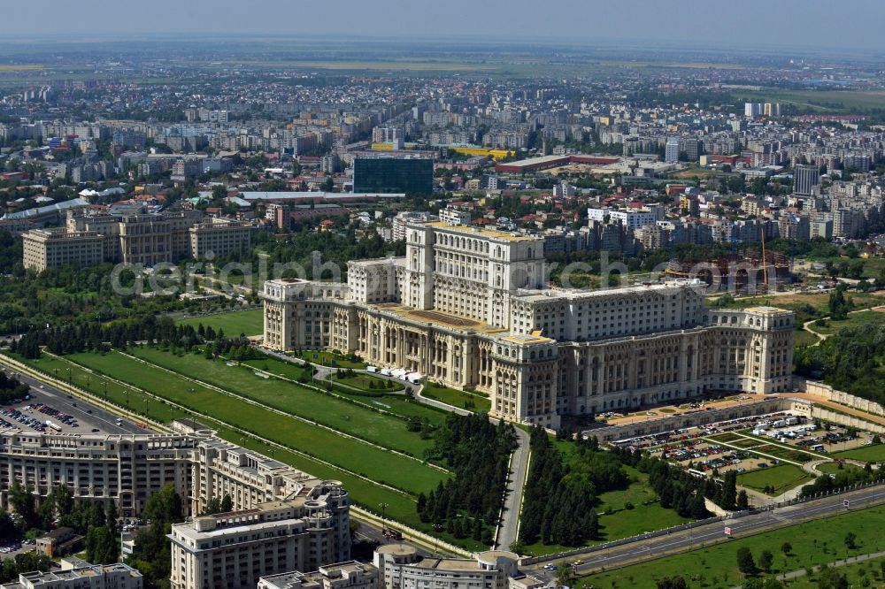 Aerial photograph Bukarest - View of the building Palace of the People in Bucharest, Romania. The magnificent building at the same time used as the parliamentary seat is built in real-socialist, Stalinist embossed power architecture and also houses the National Museum of Contemporary Art