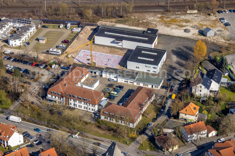 Aerial photograph Soest - Building complex of the police overlooking a construction site on the premises of Heldt Sauerland KG on street Am Gueterbahnhof in Soest in the state North Rhine-Westphalia, Germany