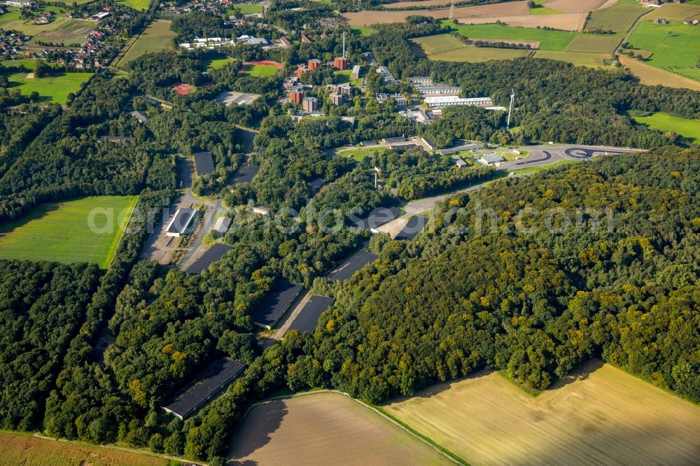 Selm from the bird's eye view: Building complex of the police in Selm in the state North Rhine-Westphalia. On the site of the car park a tent city has emerged as asylum reception centers and refugee accommodation