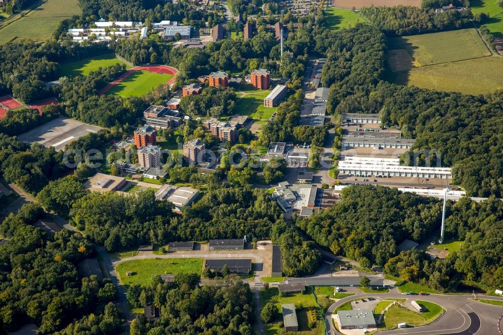 Aerial photograph Selm - Building complex of the police in Selm in the state North Rhine-Westphalia. On the site of the car park a tent city has emerged as asylum reception centers and refugee accommodation