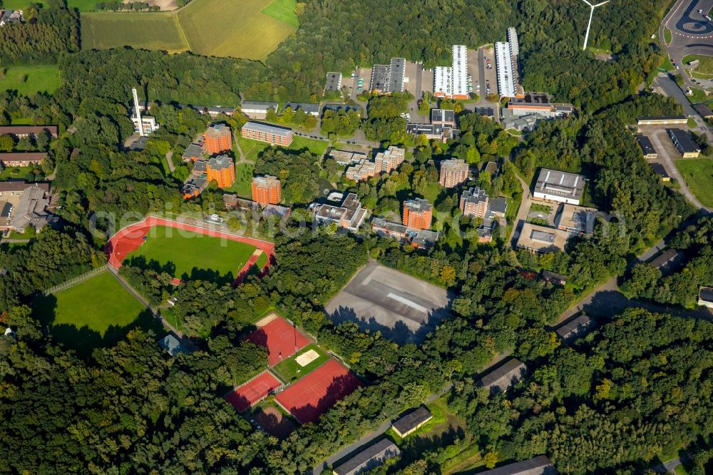 Selm from the bird's eye view: Building complex of the police in Selm in the state North Rhine-Westphalia. On the site of the car park a tent city has emerged as asylum reception centers and refugee accommodation