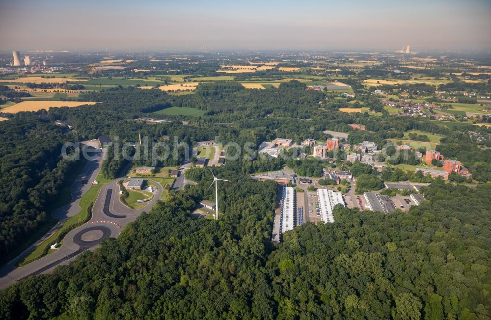 Selm from above - Building complex of the police in Selm in the state North Rhine-Westphalia. On the site of the car park a tent city has emerged as asylum reception centers and refugee accommodation