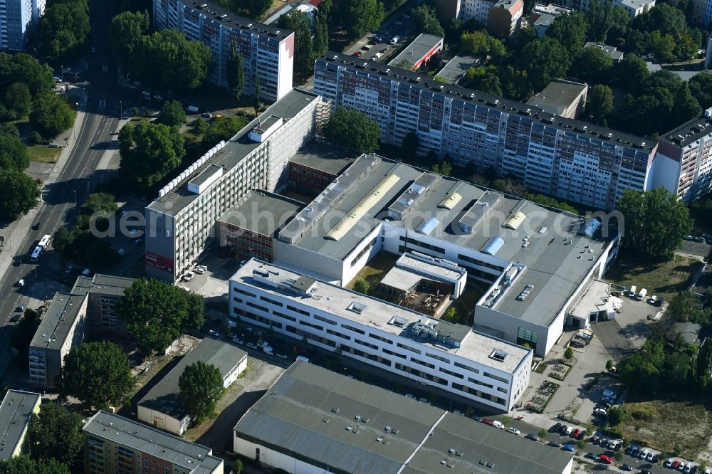 Aerial photograph Berlin - Publishing house complex of the press and media house Neues Deutschland on Franz-Mehring-Platz in the district Friedrichshain in Berlin, Germany