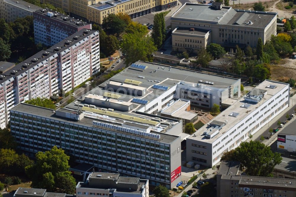 Aerial photograph Berlin - Publishing house complex of the press and media house Neues Deutschland on Franz-Mehring-Platz in the district Friedrichshain in Berlin, Germany