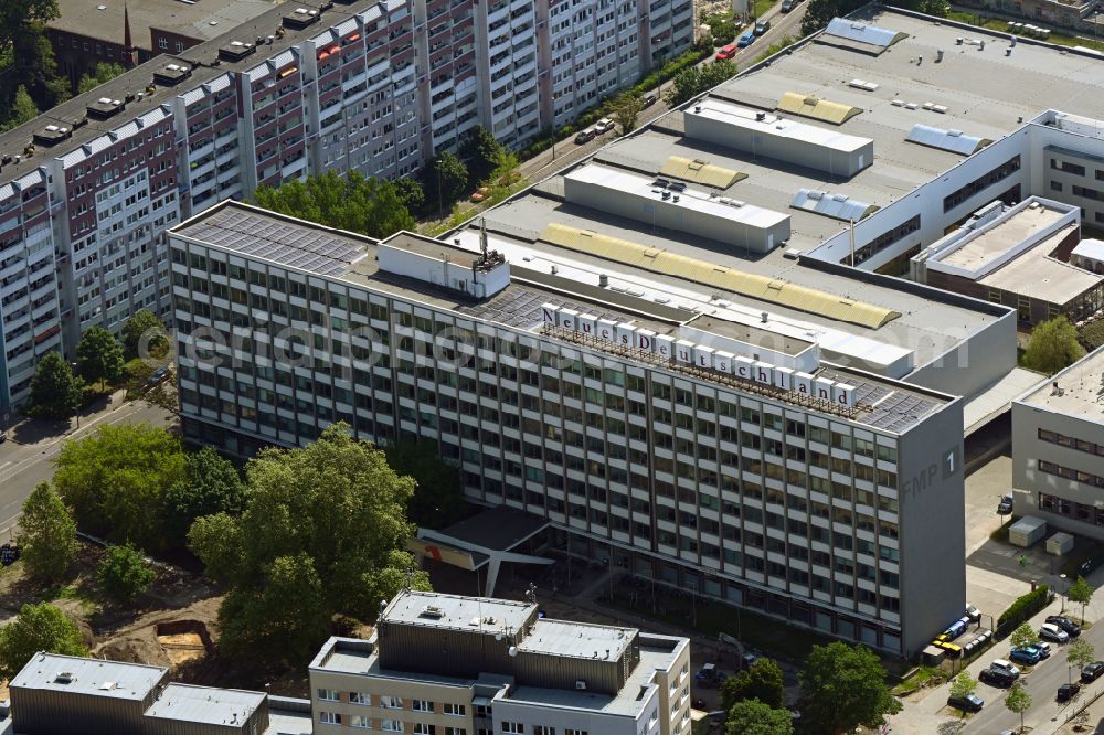 Aerial image Berlin - Publishing house complex of the press and media house Neues Deutschland on Franz-Mehring-Platz in the district Friedrichshain in Berlin, Germany