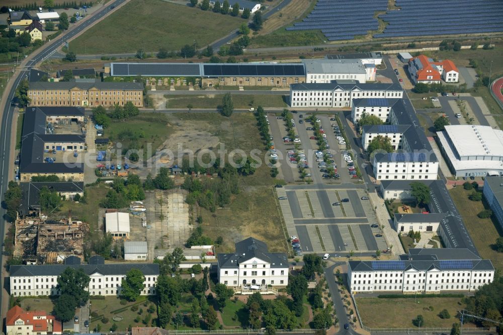 Großenhain from the bird's eye view: Building complex on Remonte square in Grossenhain in the state of Saxony. The buildings include offices of the town, a school for agriculture and an elderly care centre