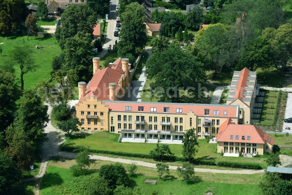 Werder (Havel) from above - Building complex in the park of Castle Petzow in Werder (Havel) in Brandenburg. The castle was built in 1825 to plans by Schinkel, the castle park was designed in 1838 by Peter Joseph Lenne