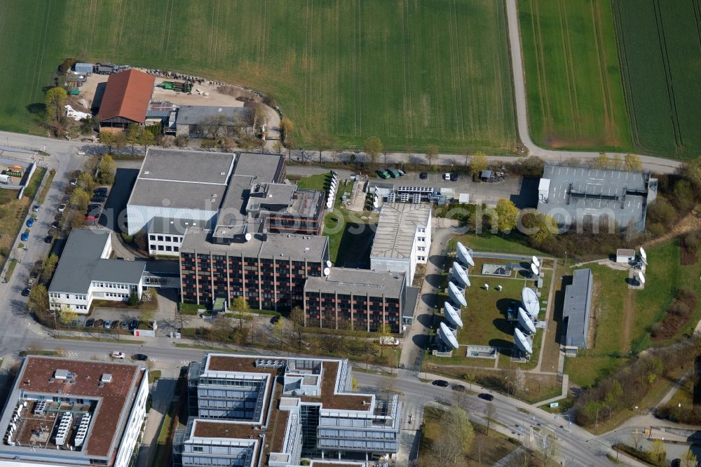 Unterföhring from the bird's eye view: Building complex with satellite dishes on the radio house of the transmitter MTI Teleport Muenchen GmbH on Beta-Strasse in Unterfoehring in the state Bavaria, Germany