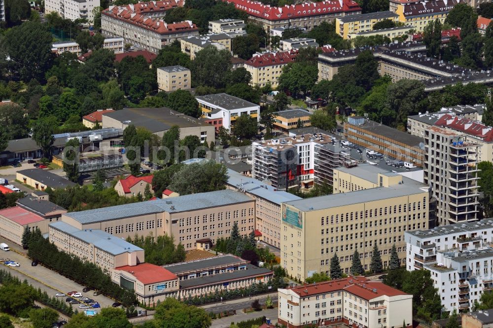 Warschau from the bird's eye view: Building complex on Bobrowiecka Street in the Mokotow District in Warsaw in Poland. The complex is located on an area including a Wolfgang Gerbere school and an intensive care therapy center. The compound is located in the North-East of the district close the city motorway A2