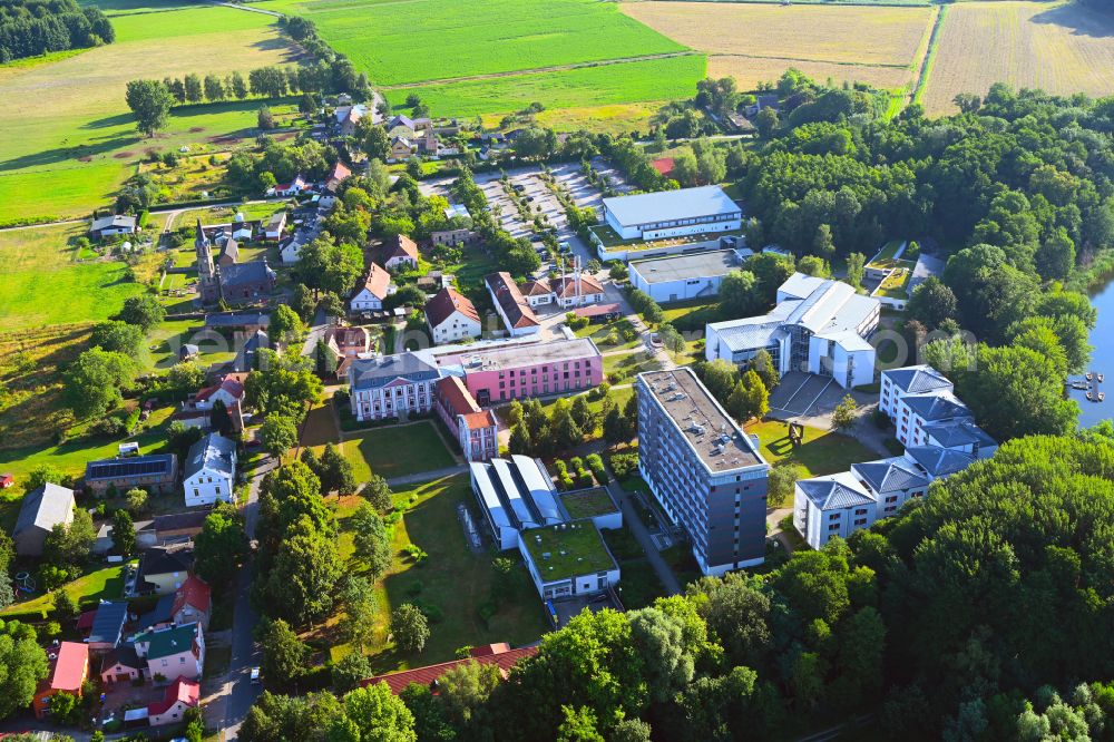 Aerial photograph Plessow - Building complex of the education and training center Bildungszentrum of Bundesfinanzverwaltung on street Plessower Hauptstrasse in Plessow in the state Brandenburg, Germany