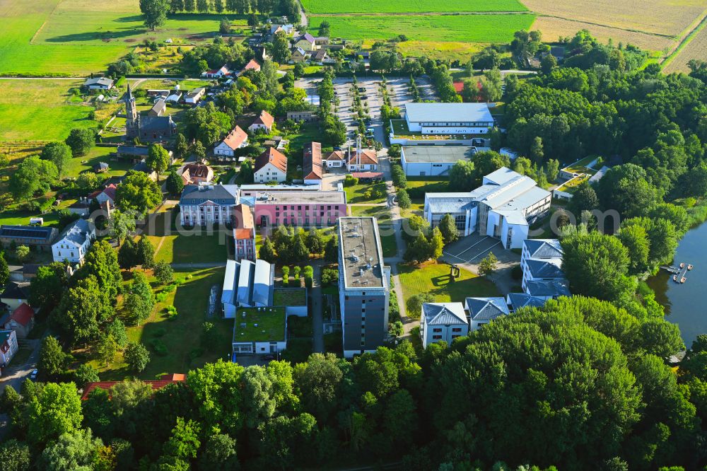 Plessow from above - Building complex of the education and training center Bildungszentrum of Bundesfinanzverwaltung on street Plessower Hauptstrasse in Plessow in the state Brandenburg, Germany