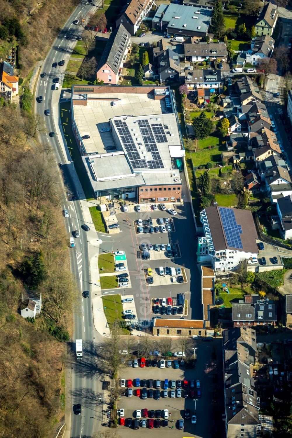 Essen from the bird's eye view: Building complex of the shopping center EKZ Edeka Velberter Strasse destrict Werden in Essen in the state North Rhine-Westphalia, Germany