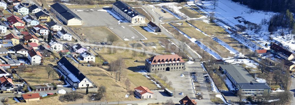 Flossenbürg from above - Blick auf die Gedenkstätte des Konzentrationslager Flossenbürg ( KZ Flossenbürg) im Oberpfälzer Wald. In der Mitte der Freiflächen, auf denen einst die Häftlingsbaracken standen, befindet sich das Gebäude der Kommandantur am Eingang zur KZ-Gedenkstätte Flossenbürg. View the memorial of the concentration camp Flossenburg (Flossenbürg) in the Upper Palatinate Forest.