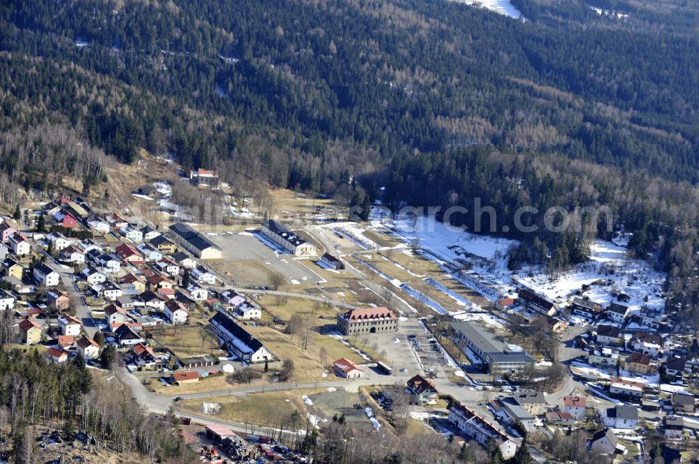 Flossenbürg from the bird's eye view: Blick auf die Gedenkstätte des Konzentrationslager Flossenbürg ( KZ Flossenbürg) im Oberpfälzer Wald. In der Mitte der Freiflächen, auf denen einst die Häftlingsbaracken standen, befindet sich das Gebäude der Kommandantur am Eingang zur KZ-Gedenkstätte Flossenbürg. View the memorial of the concentration camp Flossenburg (Flossenbürg) in the Upper Palatinate Forest.