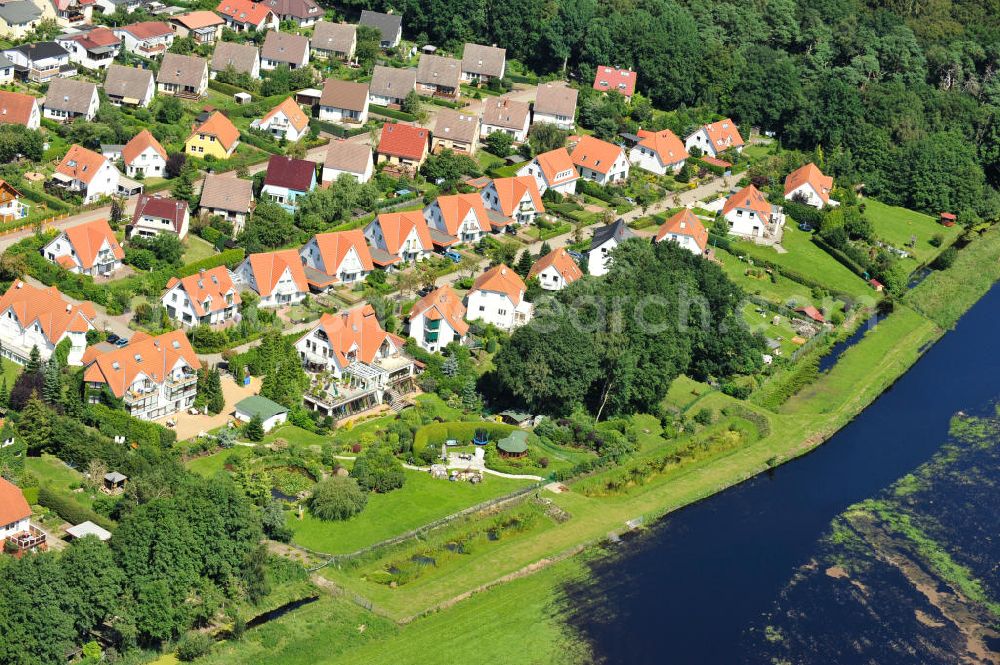 Ostseebad Graal Müritz from above - Nicht nur wie gewohnt vom Meer ist das Osteebad derzeit mit Wasser umgeben. Das durch überdurchschnittlichen Regen und Grundwassereinfluß überflutete Landschaftsschutzgebiet “Tabakwiesen” am Wohngebiet Koppenheide bietet derzeit ein ungewöhlichen Anblick. Gefahr für den unmittelbaren Wohngebietsbereich besteht derzeit aber nicht Flooded landscape conservation area tobacco fields on Graal-Müritz.