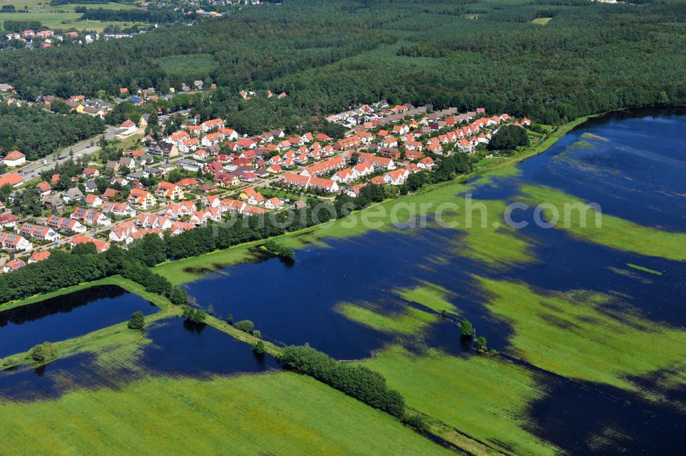 Ostseebad Graal Müritz from above - Nicht nur wie gewohnt vom Meer ist das Osteebad derzeit mit Wasser umgeben. Das durch überdurchschnittlichen Regen und Grundwassereinfluß überflutete Landschaftsschutzgebiet “Tabakwiesen” am Wohngebiet Koppenheide bietet derzeit ein ungewöhlichen Anblick. Gefahr für den unmittelbaren Wohngebietsbereich besteht derzeit aber nicht Flooded landscape conservation area tobacco fields on Graal-Müritz.