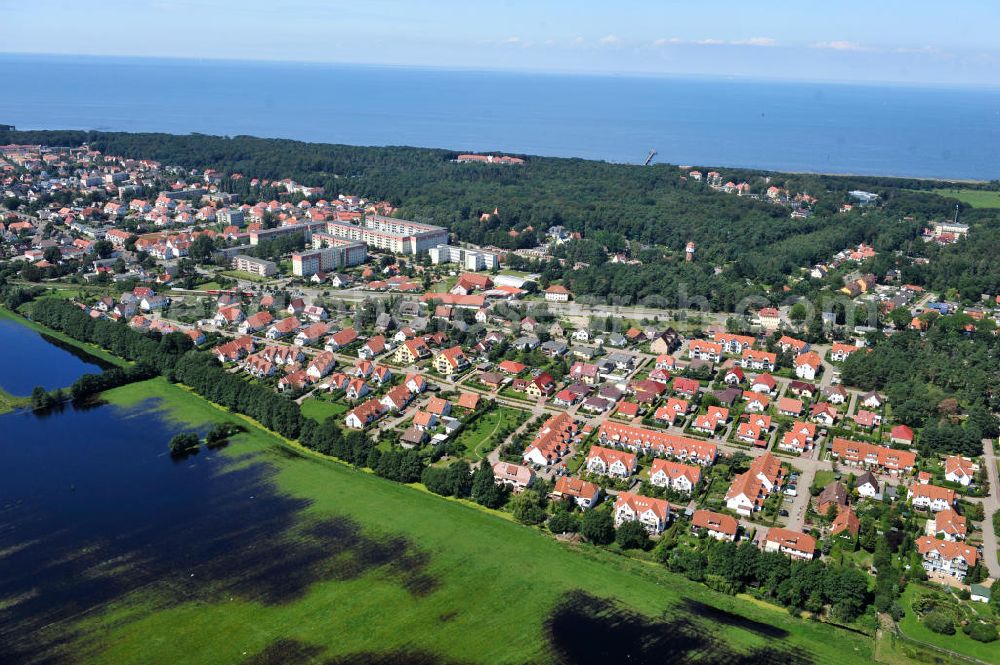 Aerial image Ostseebad Graal Müritz - Nicht nur wie gewohnt vom Meer ist das Osteebad derzeit mit Wasser umgeben. Das durch überdurchschnittlichen Regen und Grundwassereinfluß überflutete Landschaftsschutzgebiet “Tabakwiesen” am Wohngebiet Koppenheide bietet derzeit ein ungewöhlichen Anblick. Gefahr für den unmittelbaren Wohngebietsbereich besteht derzeit aber nicht Flooded landscape conservation area tobacco fields on Graal-Müritz.