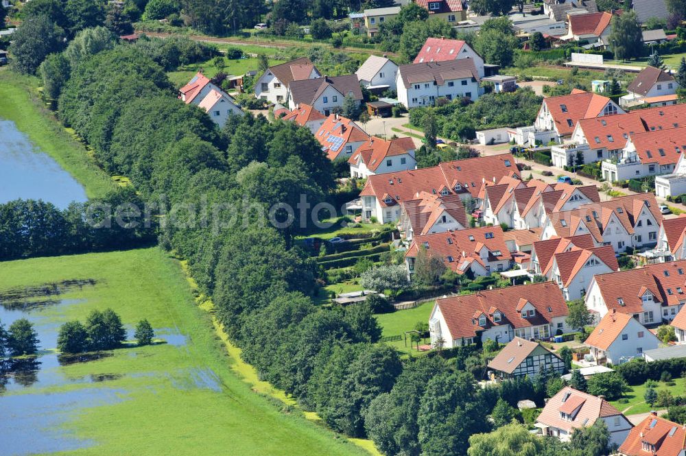 Aerial photograph Ostseebad Graal Müritz - Nicht nur wie gewohnt vom Meer ist das Osteebad derzeit mit Wasser umgeben. Das durch überdurchschnittlichen Regen und Grundwassereinfluß überflutete Landschaftsschutzgebiet “Tabakwiesen” am Wohngebiet Koppenheide bietet derzeit ein ungewöhlichen Anblick. Gefahr für den unmittelbaren Wohngebietsbereich besteht derzeit aber nicht Flooded landscape conservation area tobacco fields on Graal-Müritz.