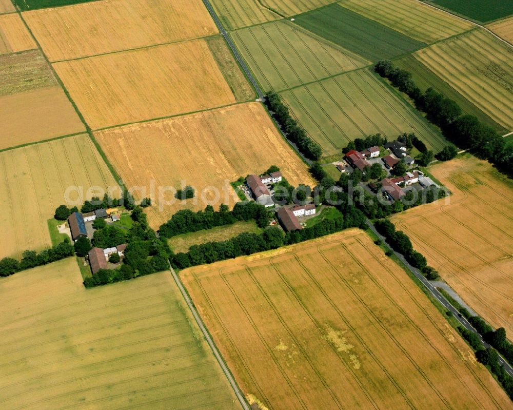 Aerial image Bad Camberg - Homestead and farm outbuildings on the edge of agricultural fields in the district Wuerges in Bad Camberg in the state Hesse, Germany