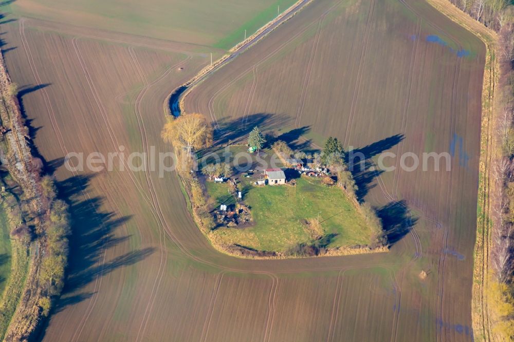 Aerial photograph Bischofferode - Homestead and farm outbuildings on the edge of agricultural fields in Bischofferode in the state Thuringia, Germany