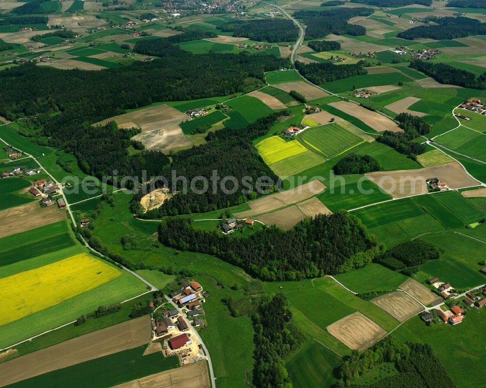 Aerial image Großwimm - Homestead and farm outbuildings on the edge of agricultural fields in Großwimm in the state Bavaria, Germany