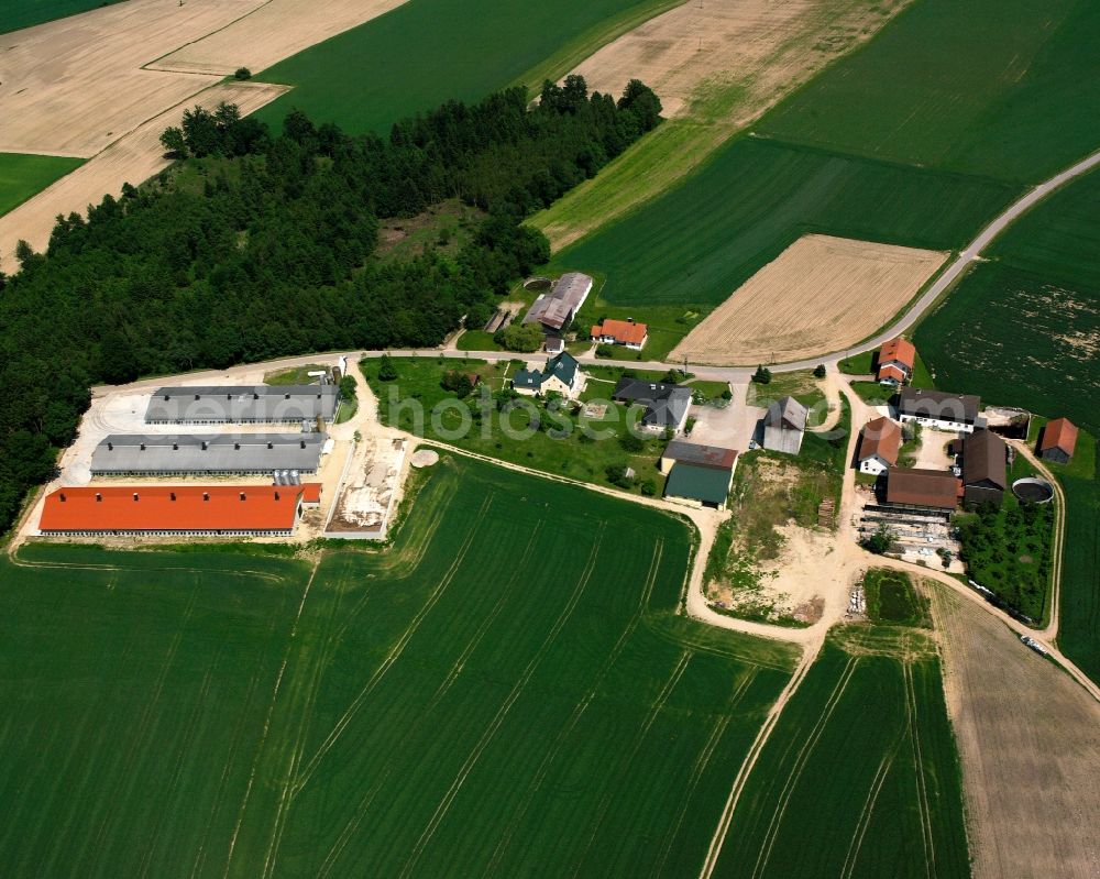 Aerial image Huttenkofen - Homestead and farm outbuildings on the edge of agricultural fields in Huttenkofen in the state Bavaria, Germany