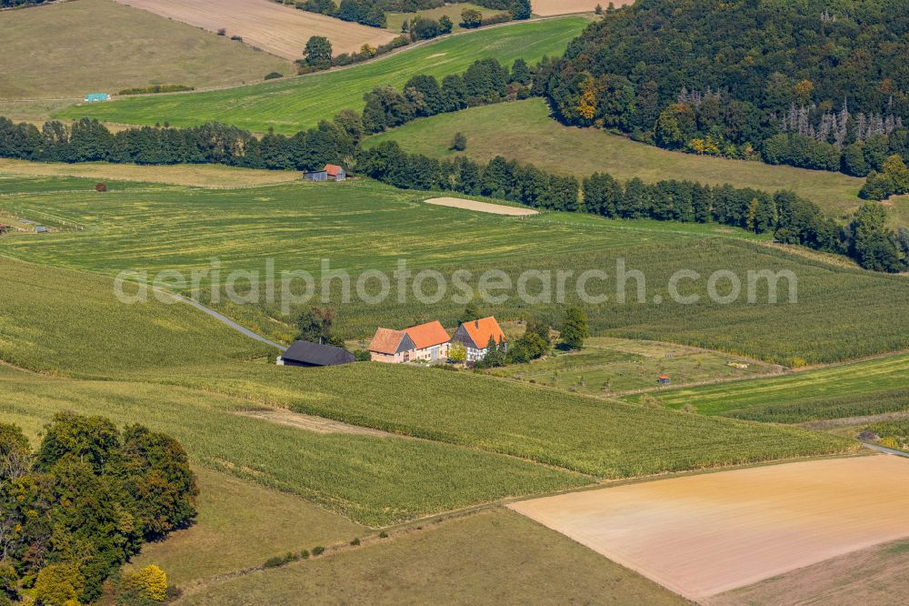 Aerial photograph Istrup - Homestead and farm outbuildings on the edge of agricultural fields in Istrup in the state North Rhine-Westphalia, Germany