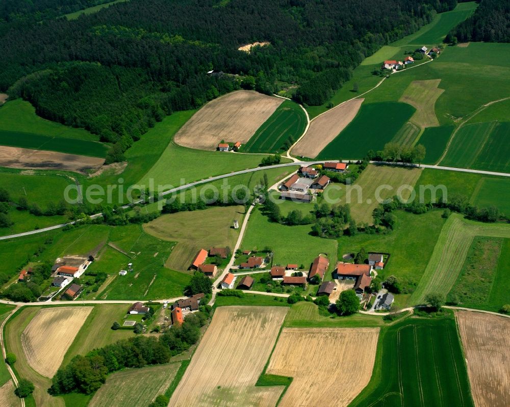 Kraham from above - Homestead and farm outbuildings on the edge of agricultural fields in Kraham in the state Bavaria, Germany