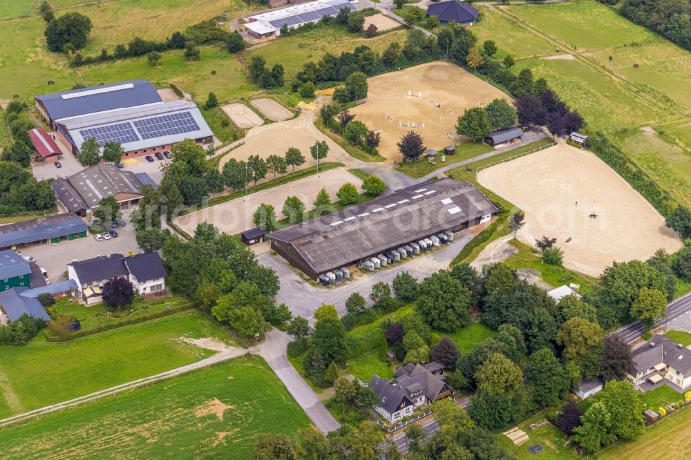 Aerial image Landwehr - Homestead and farm outbuildings on the edge of agricultural fields in Landwehr in the state North Rhine-Westphalia, Germany