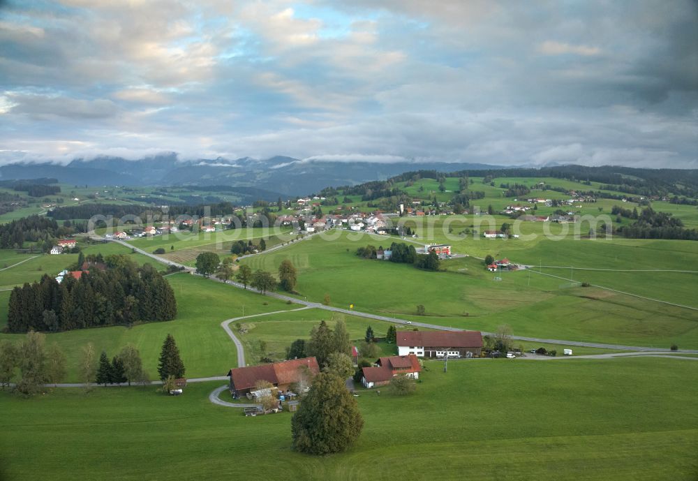 Langenried from above - Homestead and farm outbuildings on the edge of agricultural fields in Langenried in Allgaeu in the state of Bavaria, Germany