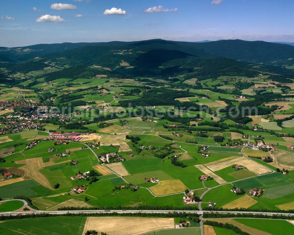 Aerial image Lindforst - Homestead and farm outbuildings on the edge of agricultural fields in Lindforst in the state Bavaria, Germany