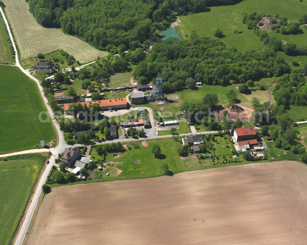 Neustadt from above - Homestead and farm outbuildings on the edge of agricultural fields Neubleicherode in Neustadt in the state Thuringia, Germany