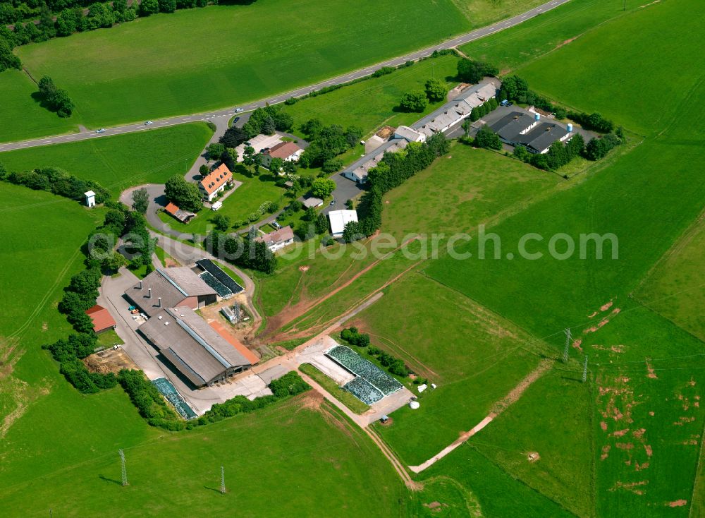 Aerial image Neumühle - Homestead and farm outbuildings on the edge of agricultural fields in Neumühle in the state Rhineland-Palatinate, Germany