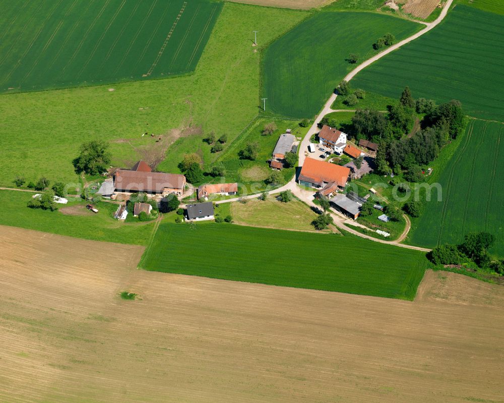 Aerial image Oberbuch - Homestead and farm outbuildings on the edge of agricultural fields in Oberbuch in the state Baden-Wuerttemberg, Germany