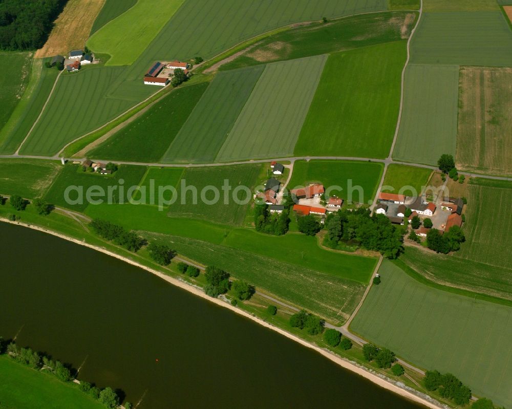 Seiderau from above - Homestead and farm outbuildings on the edge of agricultural fields in Seiderau at the Donau in the state Bavaria, Germany