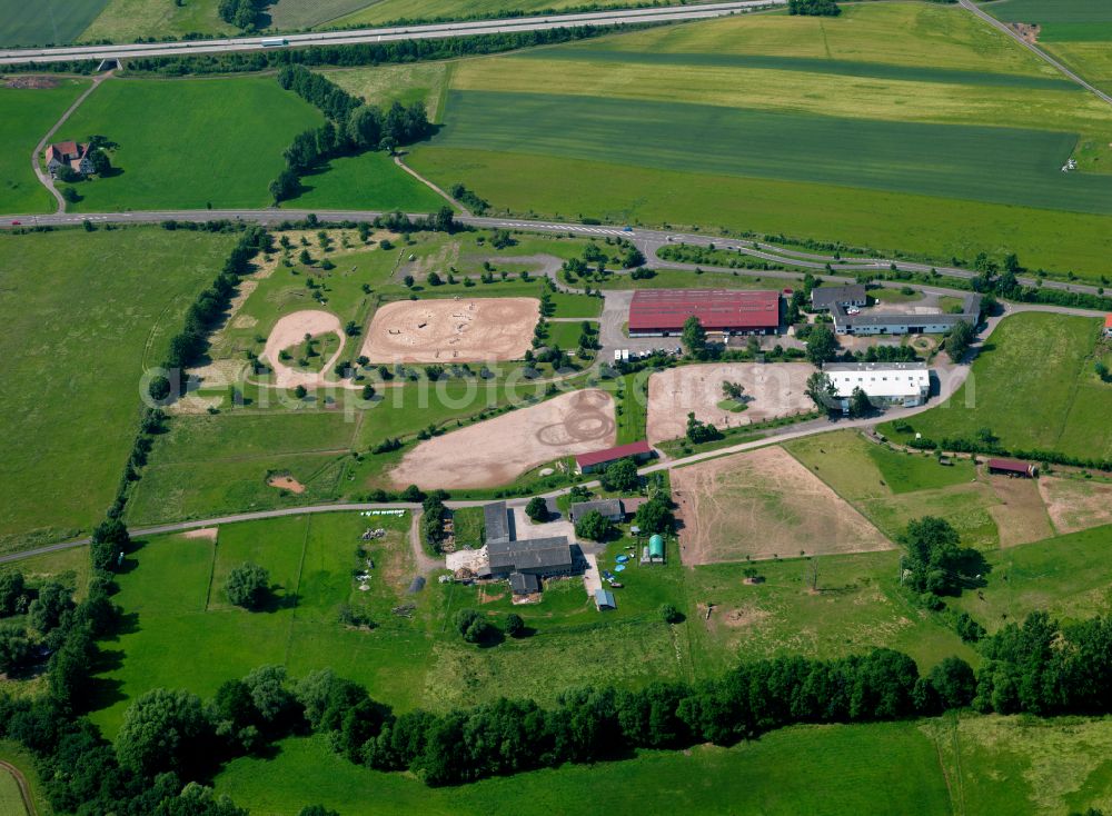 Standenbühl from above - Homestead and farm outbuildings on the edge of agricultural fields in Standenbühl in the state Rhineland-Palatinate, Germany